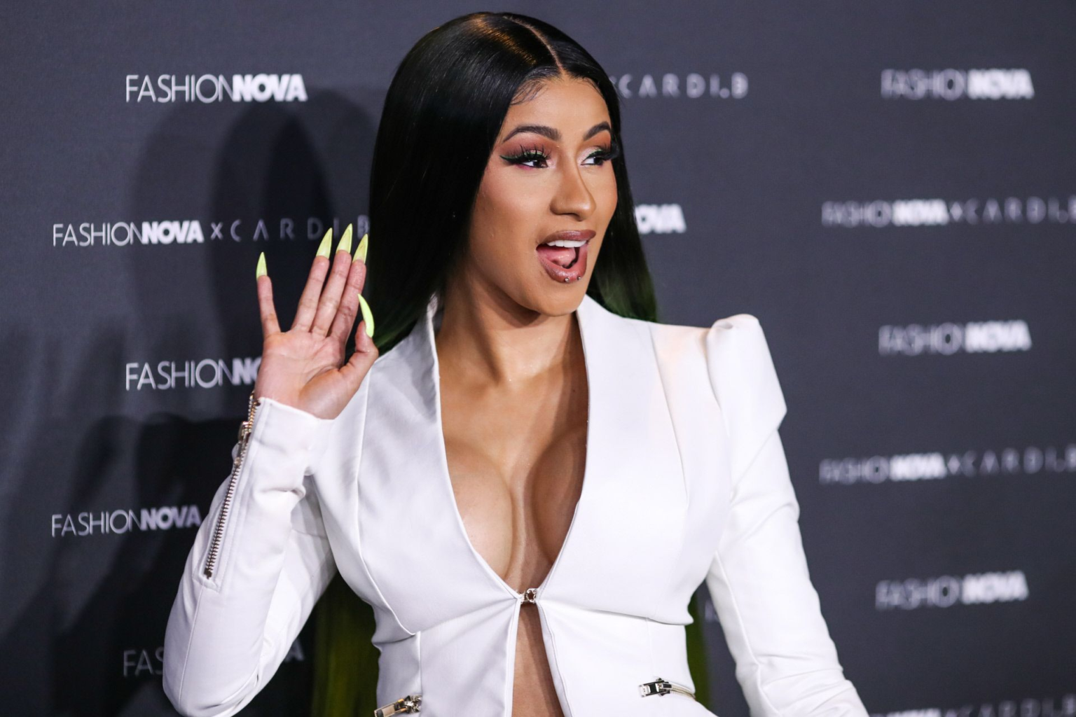 Rapper Cardi B shared her thoughts on Taylor Swift's romance with Chiefs tight end Travis Kelce.