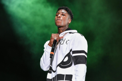 Federal prosecutors have requested a hearing on rapper NBA YoungBoy's suspected violation of house arrest rules.