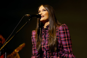 Kacey Musgraves surprised fans by releasing a digital edition of her album "Deeper Well," with an exclusive bonus track.